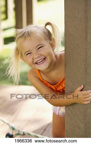 Stock Photograph - Hawaii, Young Girl Enjoying A Day At The Park.. Fotosearch
