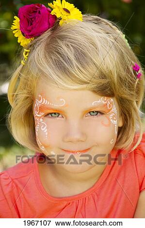 Stock Photo - Hawaii, Young Girl Wearing Facepaint.. Fotosearch