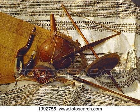 Stock Photography - Hawaiian Artifacts For Fishing, Tools On Tapa Cloth, Bishop Museum. Fotosearch