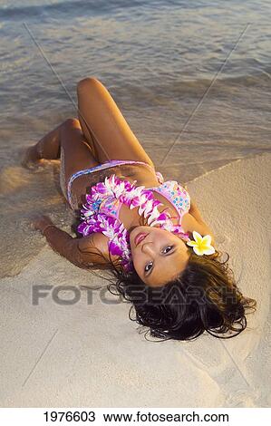 Stock Image - Hawii, Attractive Girl In The Beautiful Sunset Light At The Beach.. Fotosearch