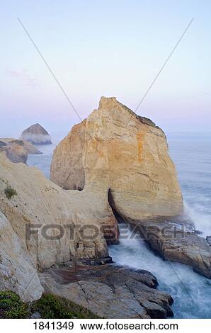 Stock Photo - Haystack Rock At Cape Kiwanda; Pacific City, Oregon, Usa. Fotosearch