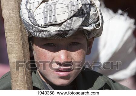 Hazara Boy In Bamiyan, Bamian Province, Afghanistan View Large Photo Image Stock Photo - Hazara Boy In Bamiyan, Bamian Province, Afghanistan. Fotosearch
