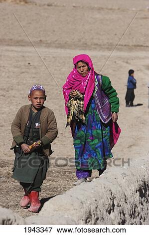 Hazara Woman And Boy In Bamiyan, Bamian Province, Afghanistan View Large Photo Image Stock Photo - Hazara Woman And Boy In Bamiyan, Bamian Province, Afghanistan. Fotosearch