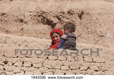 Hazara Woman And Child In Bamiyan, Bamian Province, Afghanistan View Large Photo Image Stock Photograph - Hazara Woman And Child In Bamiyan, Bamian Province, Afghanistan. Fotosearch