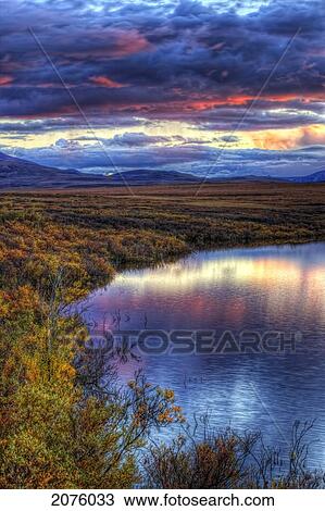 Hdr Of Sunset Over Two Moose Lake Along The Dempster Highway; Yukon Canada View Large Photo Image Stock Image - Hdr Of Sunset Over Two Moose Lake Along The Dempster Highway; Yukon Canada. Fotosearch