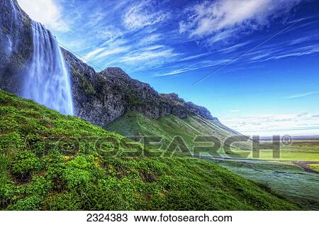 Stock Image - HDR of waterfall Seljalandsfoss along the southern coast of Iceland; Iceland. Fotosearch