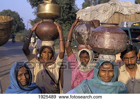 Head-Loading Water From A Well View Large Photo Image Stock Photo - Head-Loading Water From A Well. Fotosearch