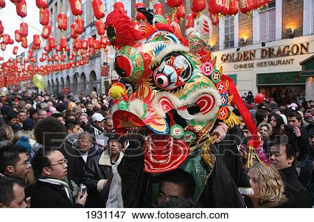 Head of Lion, part of Lion Dance troupe, moving down crowded Gerrard Street during Chinese New Year celebrations. Chinatown, London, England, UK, Europe., Chinatown, London, England, UK, Europe. View Large Photo Image Stock Photo - Head of Lion, part of Lion Dance troupe, moving down crowded Gerrard Street during Chinese New Year celebrations. Chinatown, London, England, UK, Europe., Chinatown, London, England, UK, Europe.. Fotosearch
