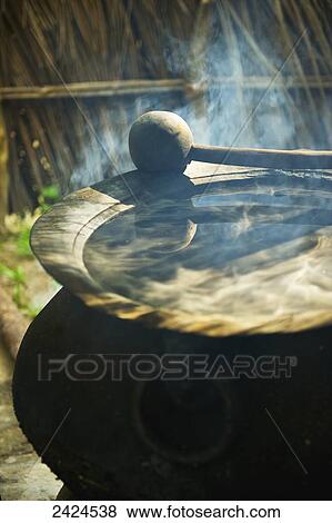 Stock Photo - Heat and smoke from a pan; Ulpotha, Embogama, Sri Lanka. Fotosearch