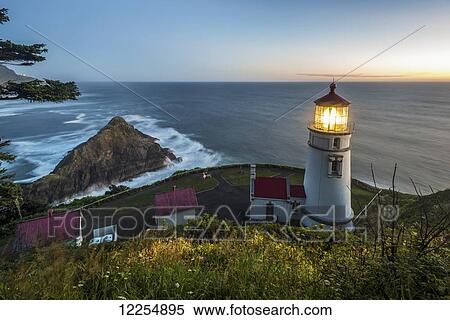 Stock Photography - Heceta Head lighthouse at dusk; Oregon, United States of America. Fotosearch