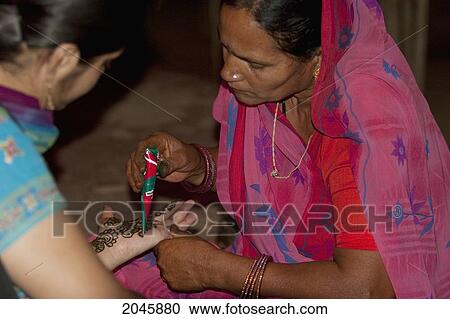 Henna Demonstration At Chokhi Dhani Ethnic Village, Jaipur, Rajasthan, India View Large Photo Image Stock Image - Henna Demonstration At Chokhi Dhani Ethnic Village, Jaipur, Rajasthan, India. Fotosearch