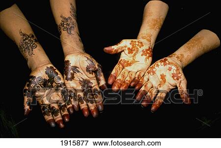 Henna Tattoos On Women's Hands At Maulidi Festival View Large Photo Image Stock Photo - Henna Tattoos On Women's Hands At Maulidi Festival. Fotosearch