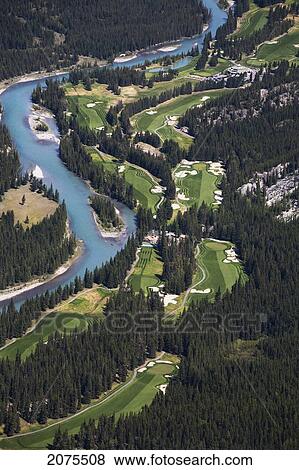High Angle Of Banff Springs Golf Course Along The Bow River; Banff Alberta Canada View Large Photo Image Stock Photo - High Angle Of Banff Springs Golf Course Along The Bow River; Banff Alberta Canada. Fotosearch