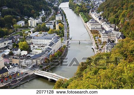 High Angle View Of A Bridge Crossing The River Lahn And Buildings Along The Water's Edge; Bad Ems Rheinland-Pfalz Germany View Large Photo Image Stock Photo - High Angle View Of A Bridge Crossing The River Lahn And Buildings Along The Water's Edge; Bad Ems Rheinland-Pfalz Germany. Fotosearch