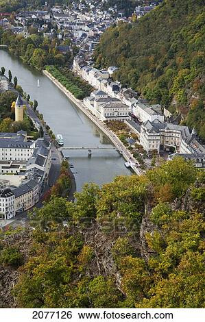 Stock Photograph - High Angle View Of A Bridge Crossing The River Lahn And Buildings Along The Water's Edge; Bad Ems Rheinland-Pfalz Germany. Fotosearch