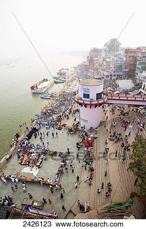 High angle view of a crowd of pilgrims at the ghats on the ganges; Varanasi, India View Large Photo Image Stock Image - High angle view of a crowd of pilgrims at the ghats on the ganges; Varanasi, India. Fotosearch