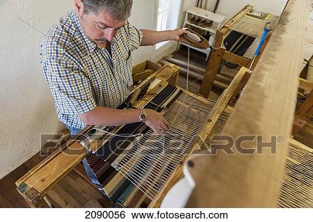 High Angle View Of A Man Making Loom Demonstration At Ortega's Weaving Shop, New Mexico, Usa View Large Photo Image Stock Photograph - High Angle View Of A Man Making Loom Demonstration At Ortega's Weaving Shop, New Mexico, Usa. Fotosearch
