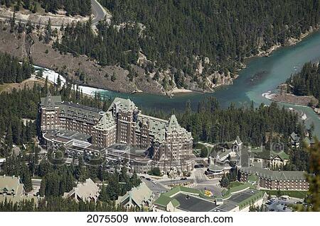 High Angle View Of Banff Springs Hotel With Bow River And Bow Falls In The Background; Banff Alberta Canada View Large Photo Image Stock Photo - High Angle View Of Banff Springs Hotel With Bow River And Bow Falls In The Background; Banff Alberta Canada. Fotosearch