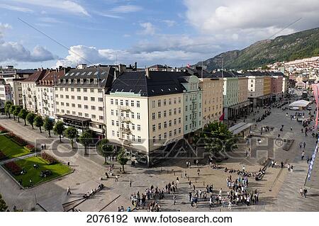 Stock Image - High Angle View Of Pedestrians In A Town Square; Bergen Norway. Fotosearch
