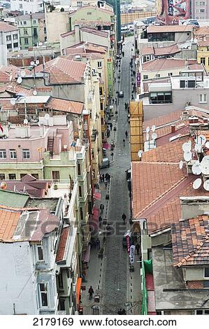 High Angle View Of Pedestrians Walking In The Street Among The Buildings In Beyoglu District; Istanbul Turkey View Large Photo Image Stock Photo - High Angle View Of Pedestrians Walking In The Street Among The Buildings In Beyoglu District; Istanbul Turkey. Fotosearch
