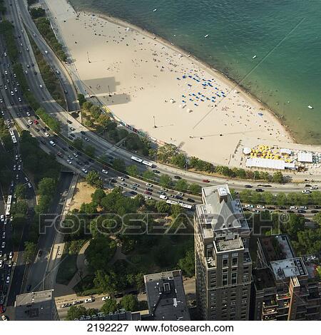 Stock Photo - High Angle View Of The Beach Along Lake Michigan Along The Road; Chicago Illinois United States Of America. Fotosearch
