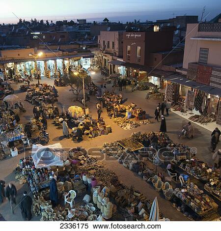 High Angle View Of The Market At Dusk; Marrakesh, Marrakech-Tensift-El Haouz, Morocco View Large Photo Image Stock Photography - High Angle View Of The Market At Dusk; Marrakesh, Marrakech-Tensift-El Haouz, Morocco. Fotosearch