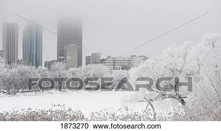 Stock Image - High Rise Buildings In The Winter; Winnipeg, Manitoba, Canada. Fotosearch