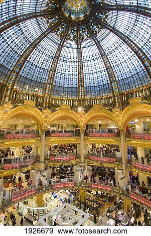 High View Of The Domed Central Area Of Galeries Lafayette, Looking Down On Shoppers, Paris, France View Large Photo Image Stock Photo - High View Of The Domed Central Area Of Galeries Lafayette, Looking Down On Shoppers, Paris, France. Fotosearch