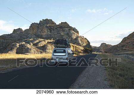 Highway No. 1 Through The Eroded Jurassic Sandstone Massif In Isalo National Park, Fianarantsoa Province, Madagascar View Large Photo Image Stock Image - Highway No. 1 Through The Eroded Jurassic Sandstone Massif In Isalo National Park, Fianarantsoa Province, Madagascar. Fotosearch