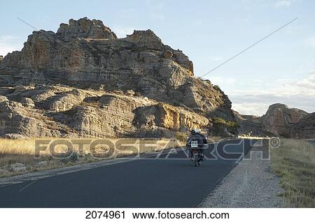 Highway No. 1 Through The Eroded Jurassic Sandstone Massif In Isalo National Park, Fianarantsoa Province, Madagascar View Large Photo Image Stock Image - Highway No. 1 Through The Eroded Jurassic Sandstone Massif In Isalo National Park, Fianarantsoa Province, Madagascar. Fotosearch