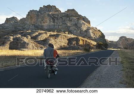 Highway No. 1 Through The Eroded Jurassic Sandstone Massif In Isalo National Park, Fianarantsoa Province, Madagascar View Large Photo Image Stock Image - Highway No. 1 Through The Eroded Jurassic Sandstone Massif In Isalo National Park, Fianarantsoa Province, Madagascar. Fotosearch