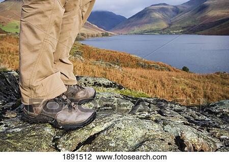 Stock Image - Hiker Near Lake In Wasdale. Fotosearch