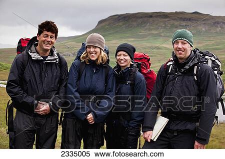 Hikers Among Hills Of Western Lake District; Cumbria, England, Uk View Large Photo Image Stock Photography - Hikers Among Hills Of Western Lake District; Cumbria, England, Uk. Fotosearch