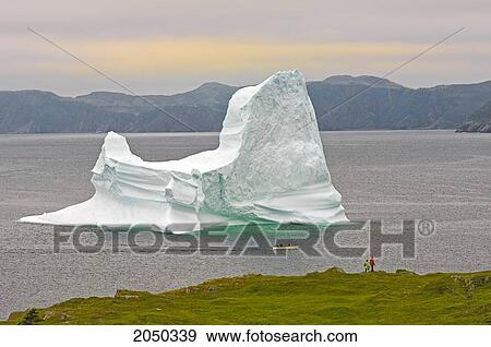 Hikers And Boaters View Iceberg In Trinity Bay Off The Bonavista Peninsula Of Eastern Newfoundland View Large Photo Image Stock Photo - Hikers And Boaters View Iceberg In Trinity Bay Off The Bonavista Peninsula Of Eastern Newfoundland. Fotosearch