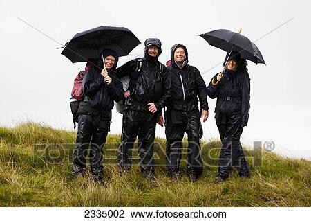 Hikers In Downpour While Walking In Hills Of Western Lake District; Cumbria, England, Uk View Large Photo Image Stock Image - Hikers In Downpour While Walking In Hills Of Western Lake District; Cumbria, England, Uk. Fotosearch