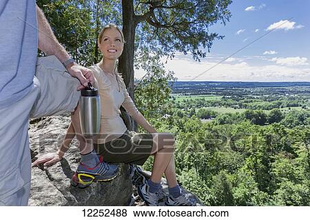 Hikers taking a break at Rattlesnake Point; Milton, Ontario View Large Photo Image Stock Photo - Hikers taking a break at Rattlesnake Point; Milton, Ontario. Fotosearch