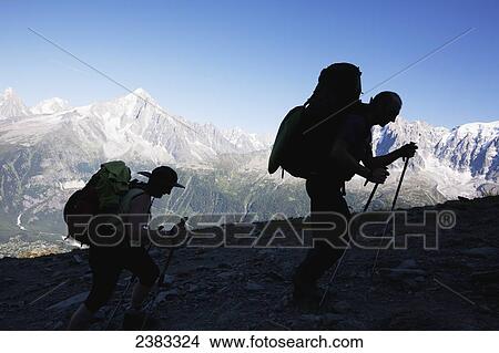 Hiking above Chamonix-Mont Blanc valley, with Mont Blanc mountain in the background, France View Large Photo Image Picture - Hiking above Chamonix-Mont Blanc valley, with Mont Blanc mountain in the background, France. Fotosearch