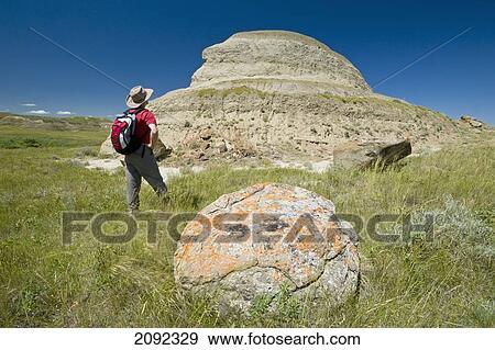 Stock Photo - Hiking In The Killdeer Badlands In East Block Of Grasslands National Park; Saskatchewan Canada. Fotosearch