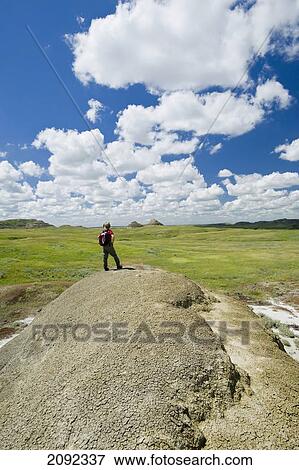 Stock Photo - Hiking In The Killdeer Badlands In East Block Of Grasslands National Park; Saskatchewan Canada. Fotosearch