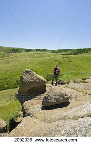 Stock Photograph - Hiking In The Killdeer Badlands In East Block Of Grasslands National Park; Saskatchewan Canada. Fotosearch