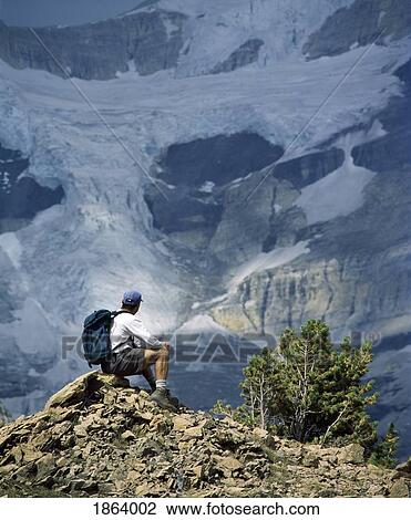 Stock Image - Hiking In The Rocky Mountains; Banff, Alberta, Canada. Fotosearch