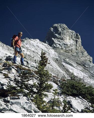 Hiking In The Rocky Mountains, Canmore, Alberta, Canada View Large Photo Image Stock Photo - Hiking In The Rocky Mountains, Canmore, Alberta, Canada. Fotosearch