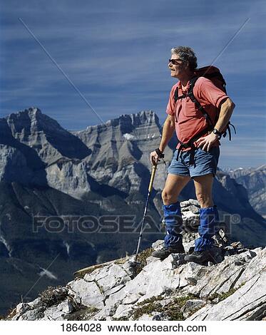 Hiking In The Rocky Mountains; Canmore, Alberta, Canada View Large Photo Image Stock Photo - Hiking In The Rocky Mountains; Canmore, Alberta, Canada. Fotosearch