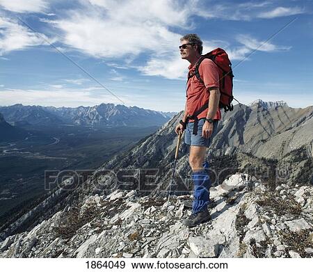 Hiking In The Rocky Mountains, Canmore, Alberta, Canada View Large Photo Image Stock Photo - Hiking In The Rocky Mountains, Canmore, Alberta, Canada. Fotosearch