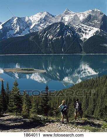 Stock Image - Hiking In The Rocky Mountains; Kananaskis, Alberta, Canada. Fotosearch