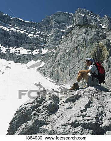 Stock Image - Hiking In The Rocky Mountains. Fotosearch
