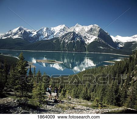 Hiking In The Rocky Mountains; Kananaskis, Alberta, Canada View Large Photo Image Stock Photo - Hiking In The Rocky Mountains; Kananaskis, Alberta, Canada. Fotosearch
