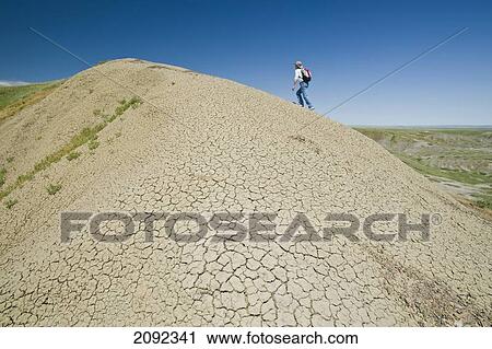 Stock Image - Hiking On Top Of 70 Mile Butte In West Block Of Grasslands National Park; Saskatchewan Canada. Fotosearch