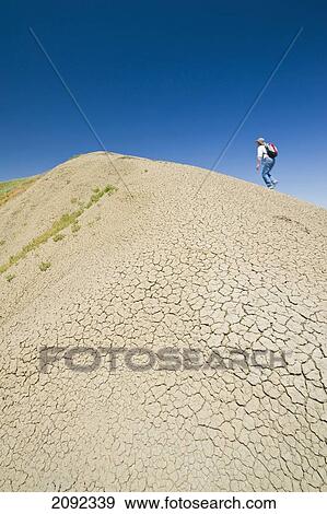 Stock Photo - Hiking On Top Of 70 Mile Butte In West Block Of Grasslands National Park; Saskatchewan Canada. Fotosearch