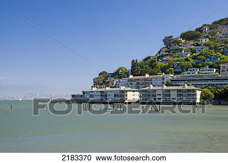 Stock Image - Hillside Houses Of Sausalito With Downtown San Francisco In The Background; Sausalito California United States Of America. Fotosearch